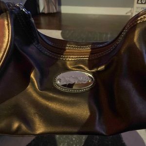 Gold XOXO purse, never been used but no tags on this one